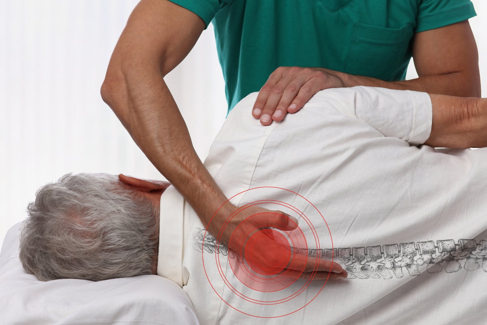 Senior man having chiropractic back adjustment Osteopathy Physiotherapy pain relief concept عربيّةكوم Arrabiacom